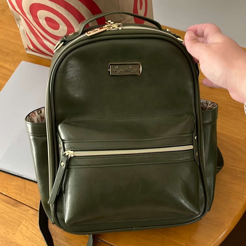 Olive leather itzy ritzy mini with rainbow inside